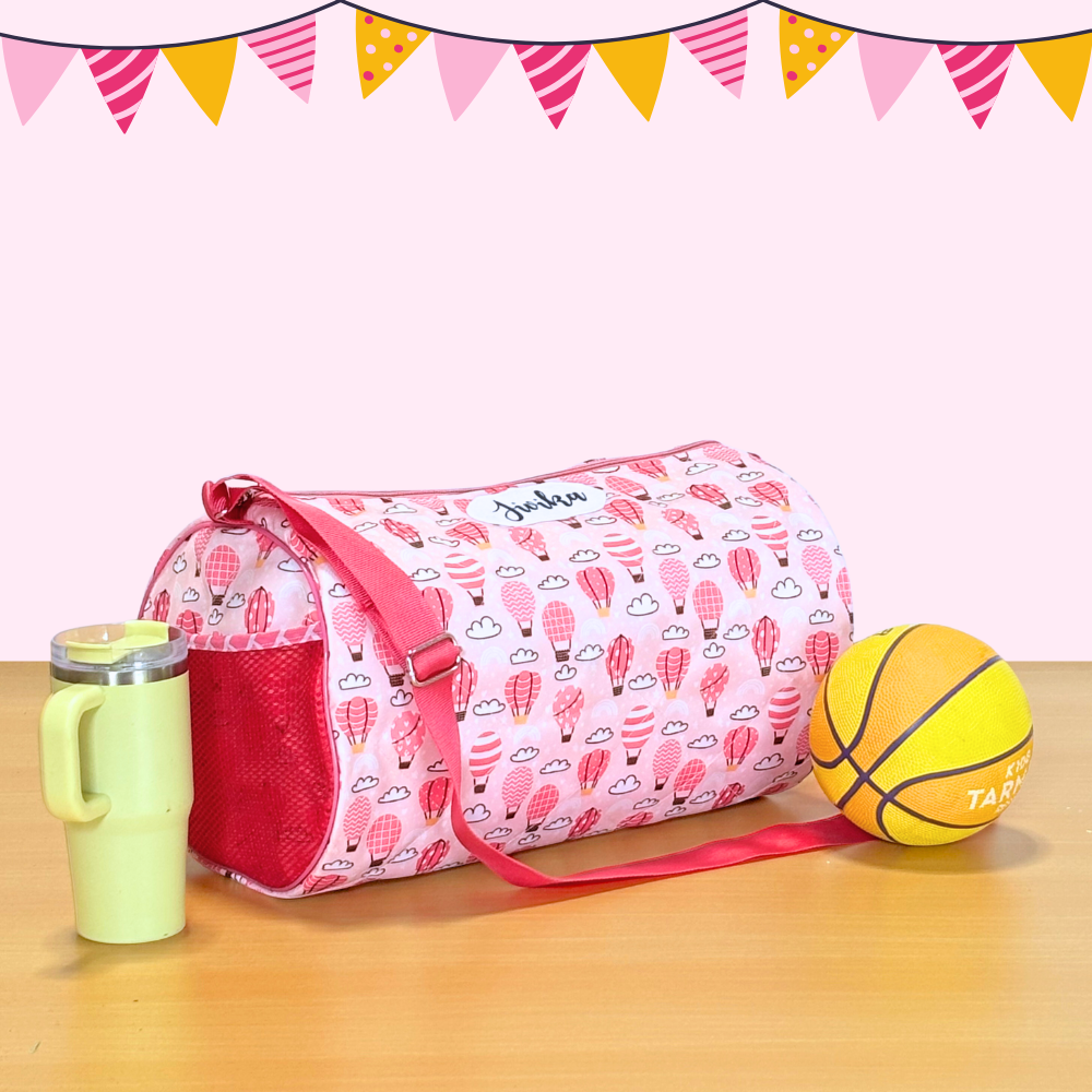 Pink and red duffel bag