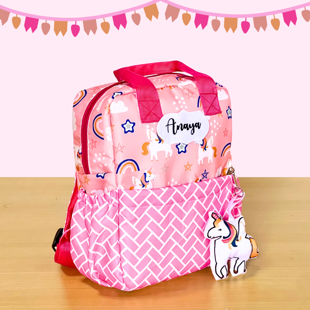 Pink backpack with unicorn design