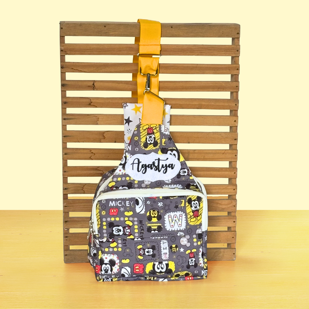 Sling bag with yellow strap