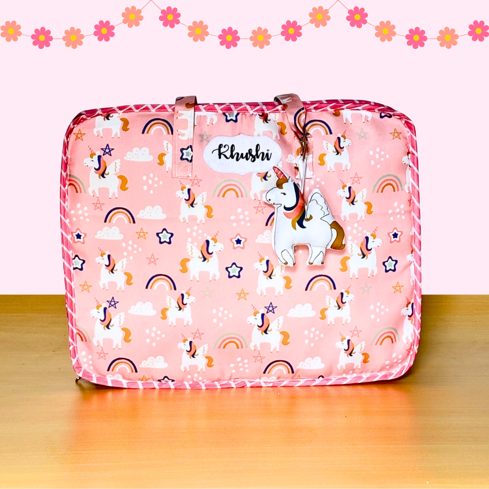 Pink suitcase with unicorn