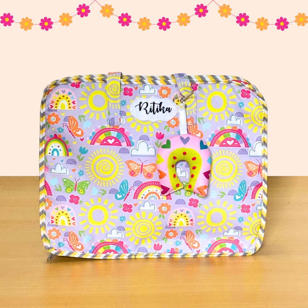 Colorful suitcase with cartoon patterns