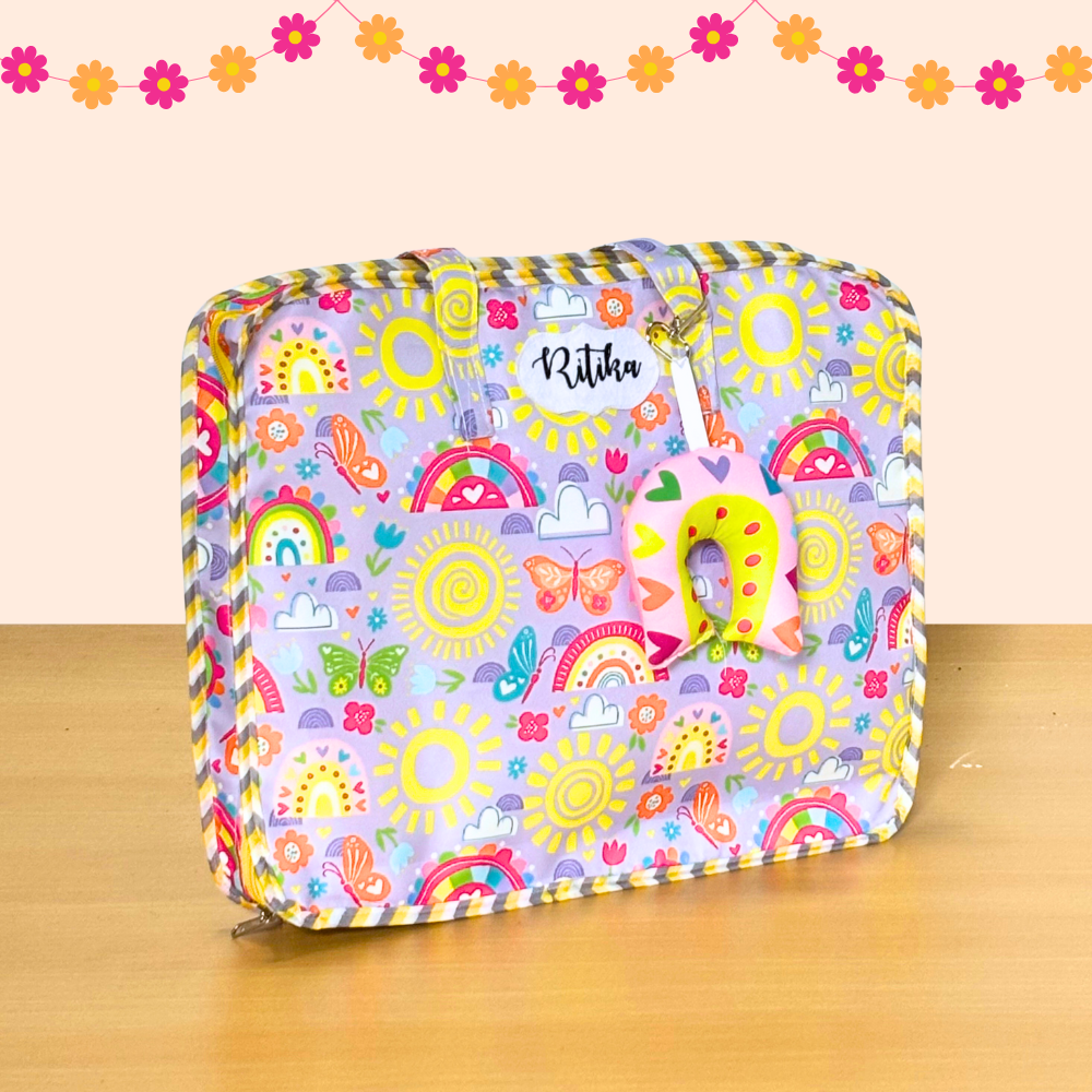 Colorful suitcase with cartoon patterns