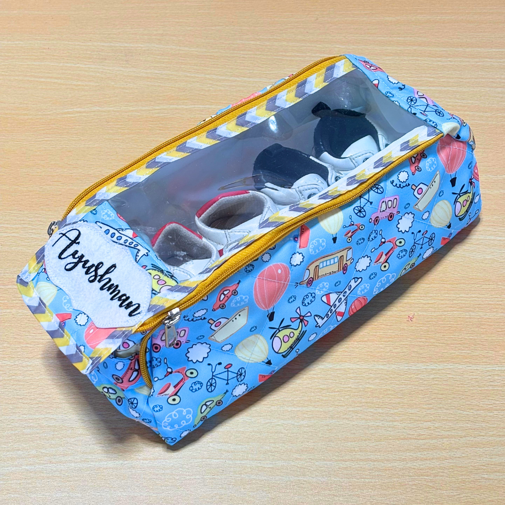 Blue pencil case with cartoon designs