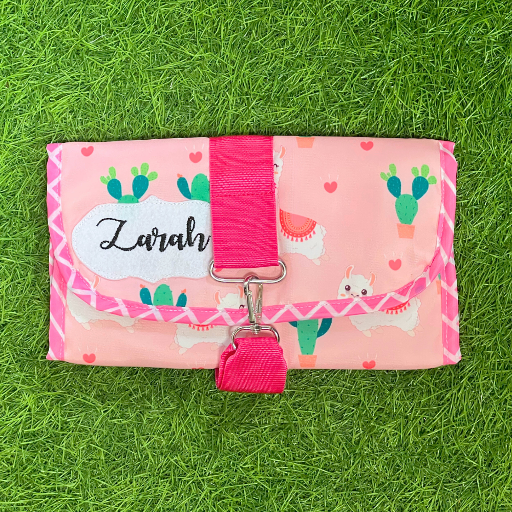 Pink pouch with cactus design