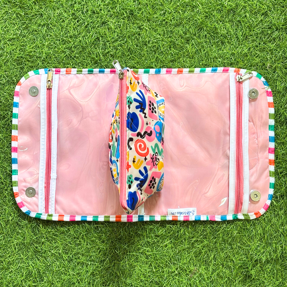 Pink wallet with colorful patterns