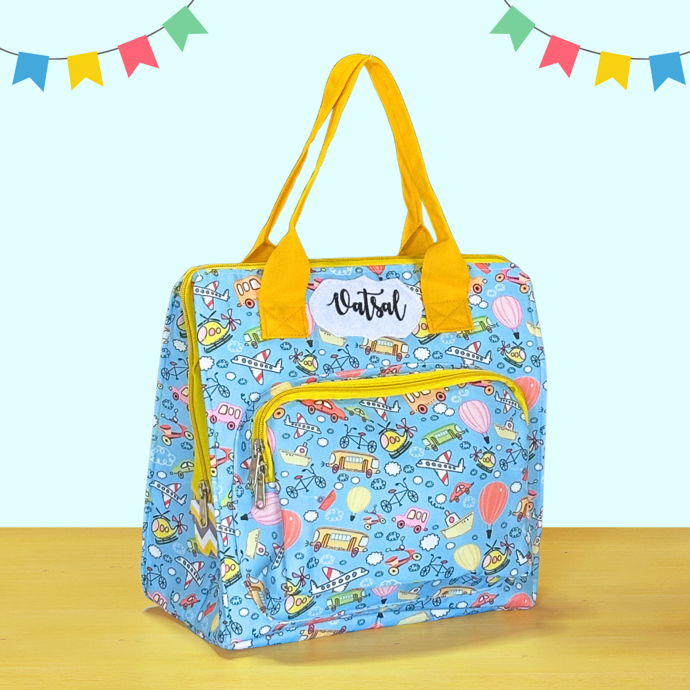 Blue patterned bag with yellow handles