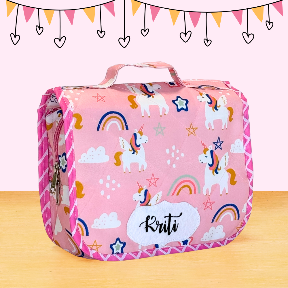 Pink lunch bag with unicorn and rainbow patterns