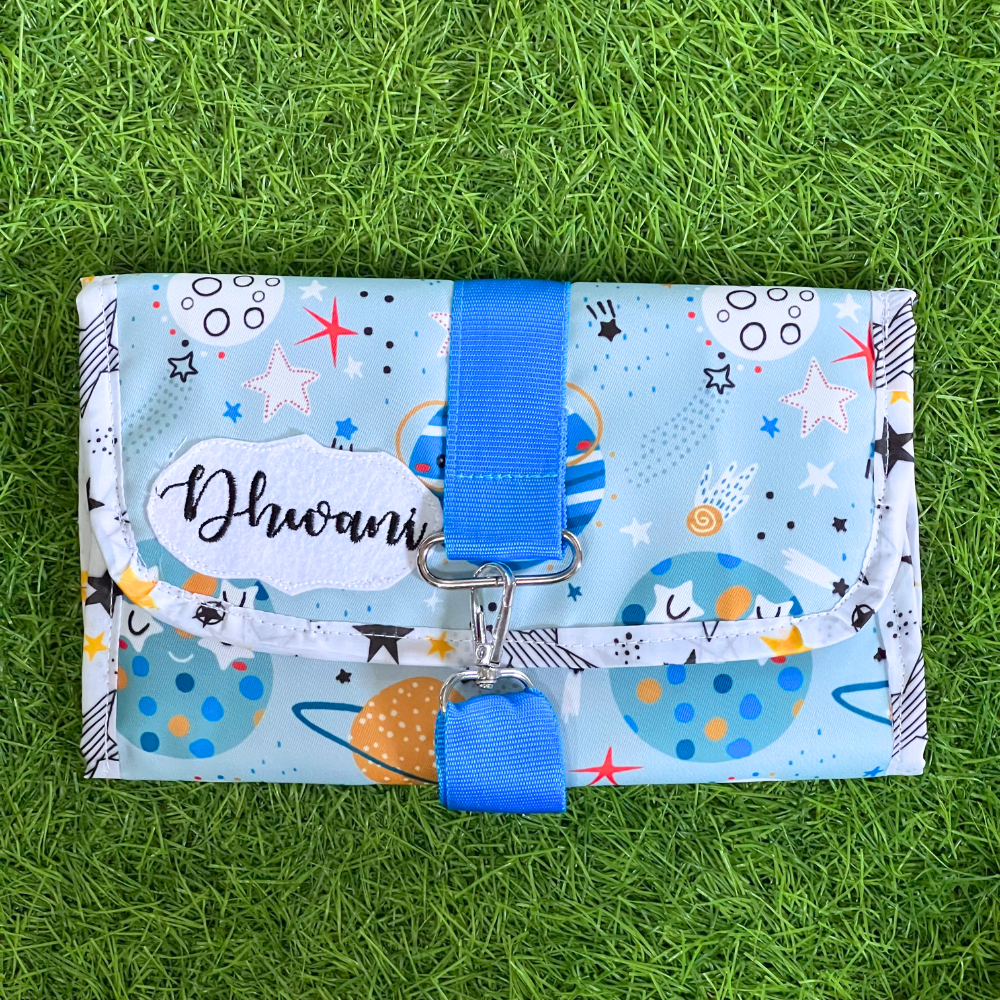 Fabric wallet with space-themed design