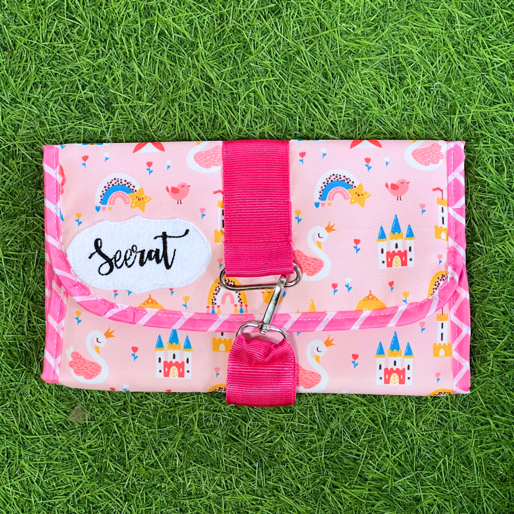Pink wallet with colorful patterns