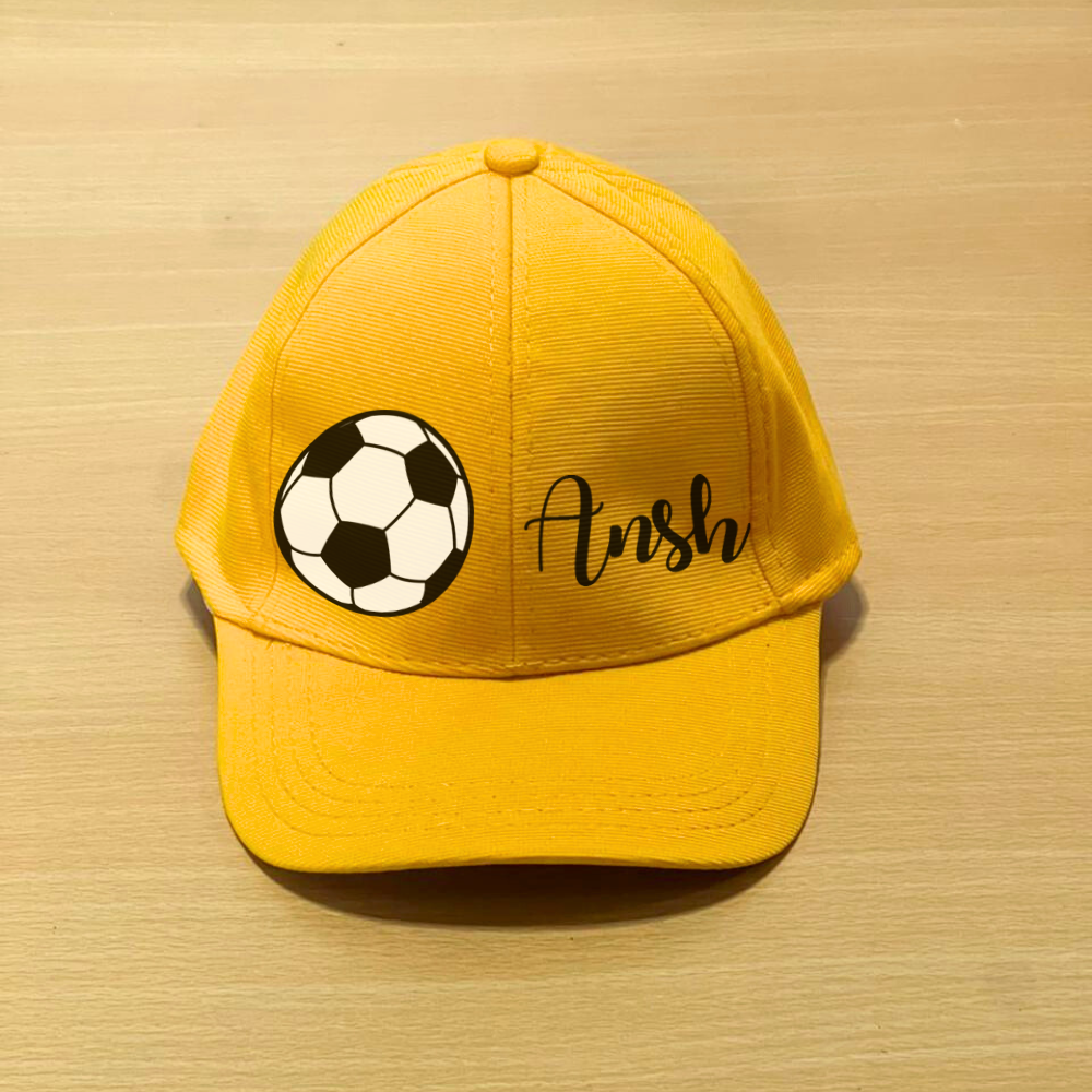 Yellow cap with soccer ball
