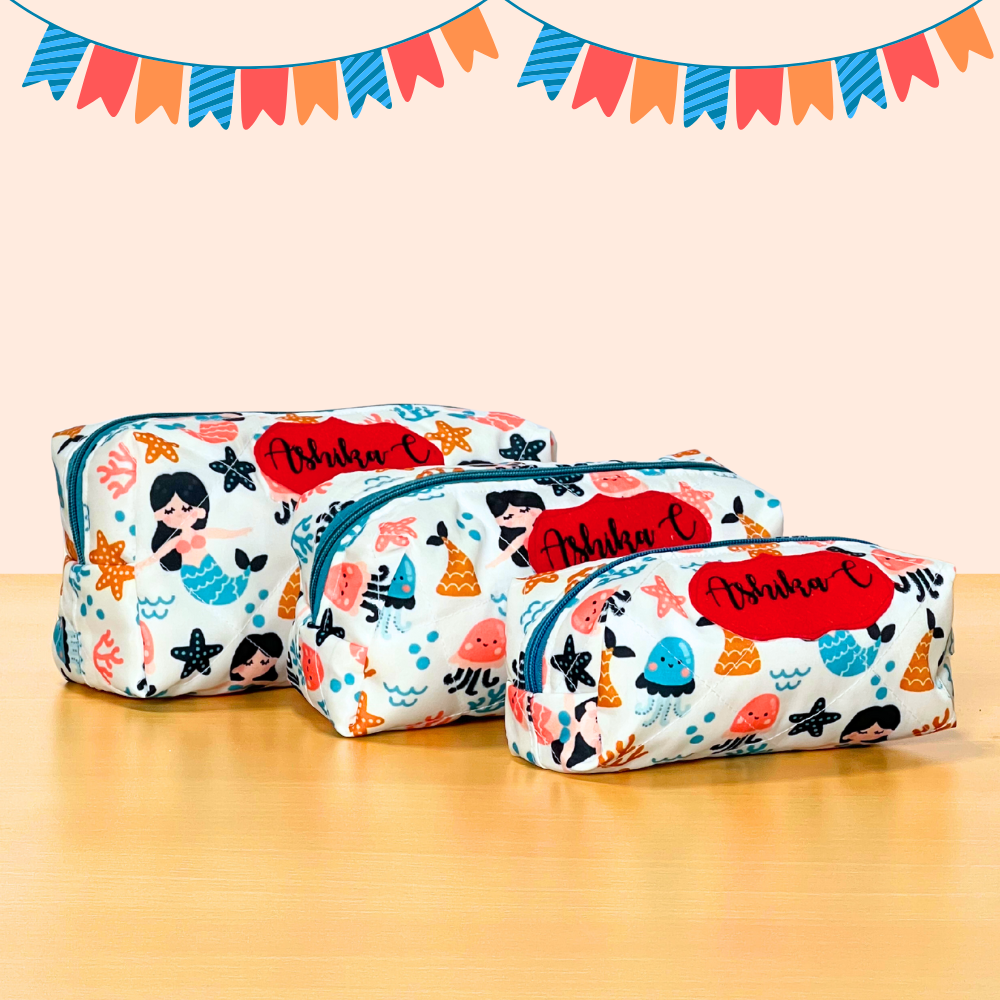Set of three colorful pouches