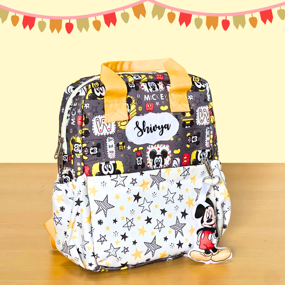 Backpack with Mickey Mouse pattern