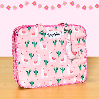 Pink suitcase with llama 
