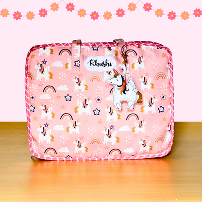Pink suitcase with unicorn