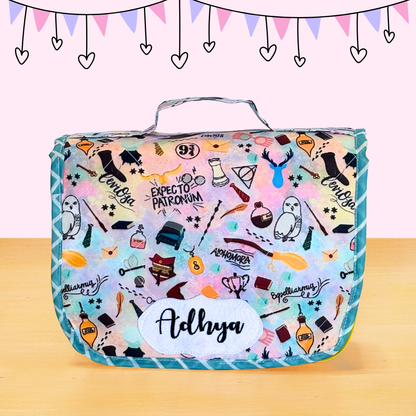 Multicolored patterned bag with 'Adhya' branding