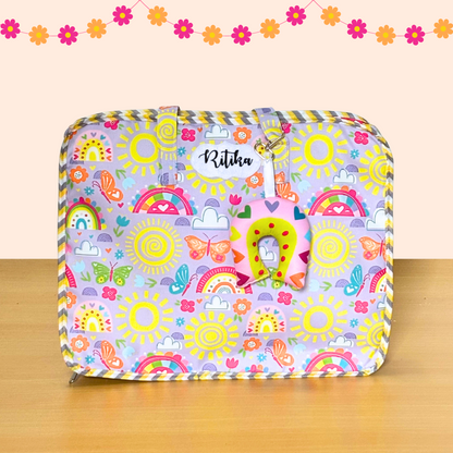 Colorful suitcase with cartoon patterns