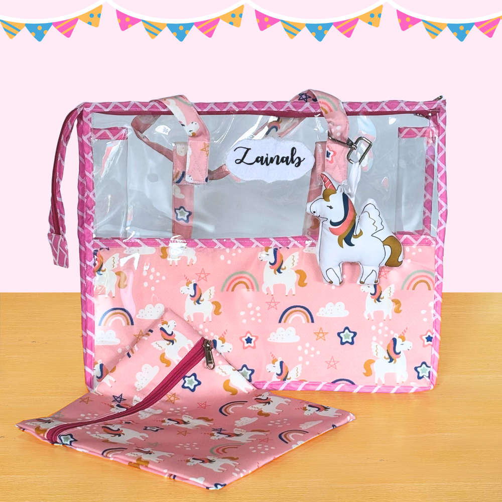 Pink baby crib with unicorn design