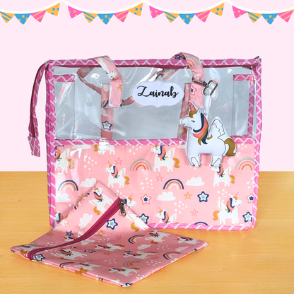 Pink baby crib with unicorn design