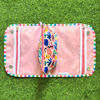 Pink wallet with colorful patterns