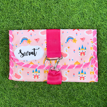 Pink wallet with colorful patterns
