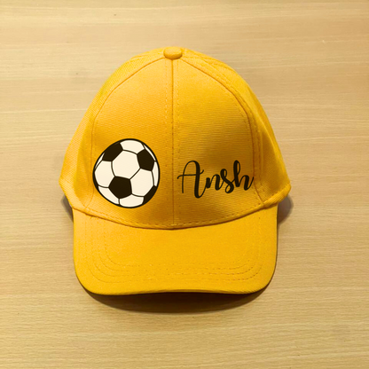 Yellow cap with soccer ball 