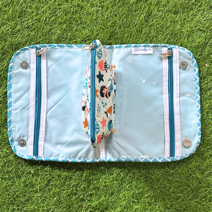 Light blue pouch with colorful strap