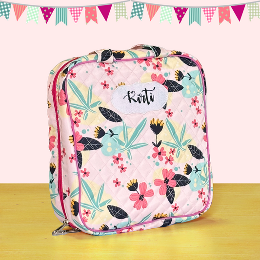 Floral patterned bag with 'Kotti' branding